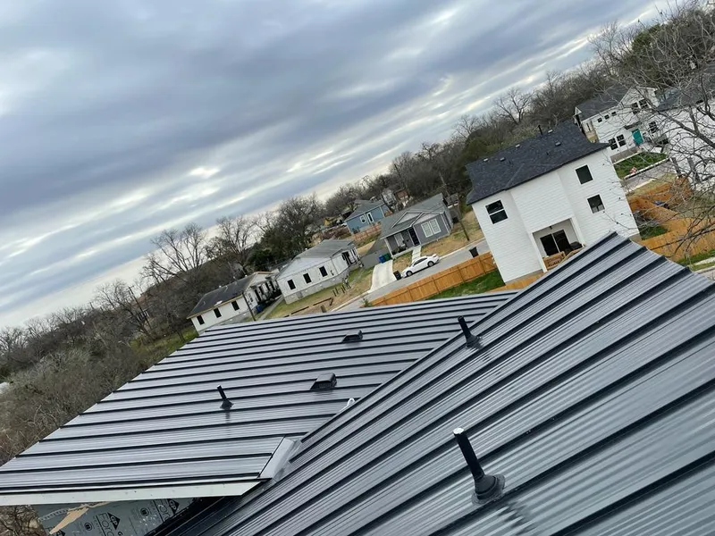Standing seam metal roof panels with vents for Skylight Repair in Kettering
